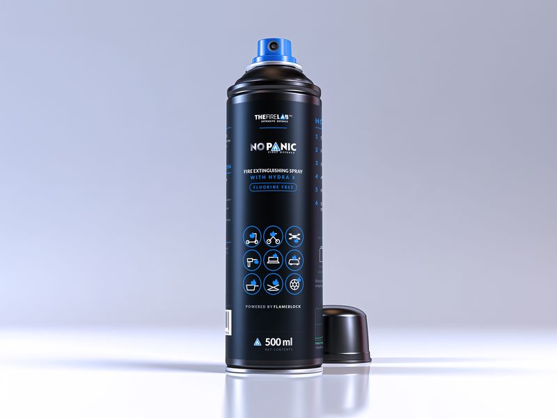 A NOPANIC aerosol can with its cap beside it.